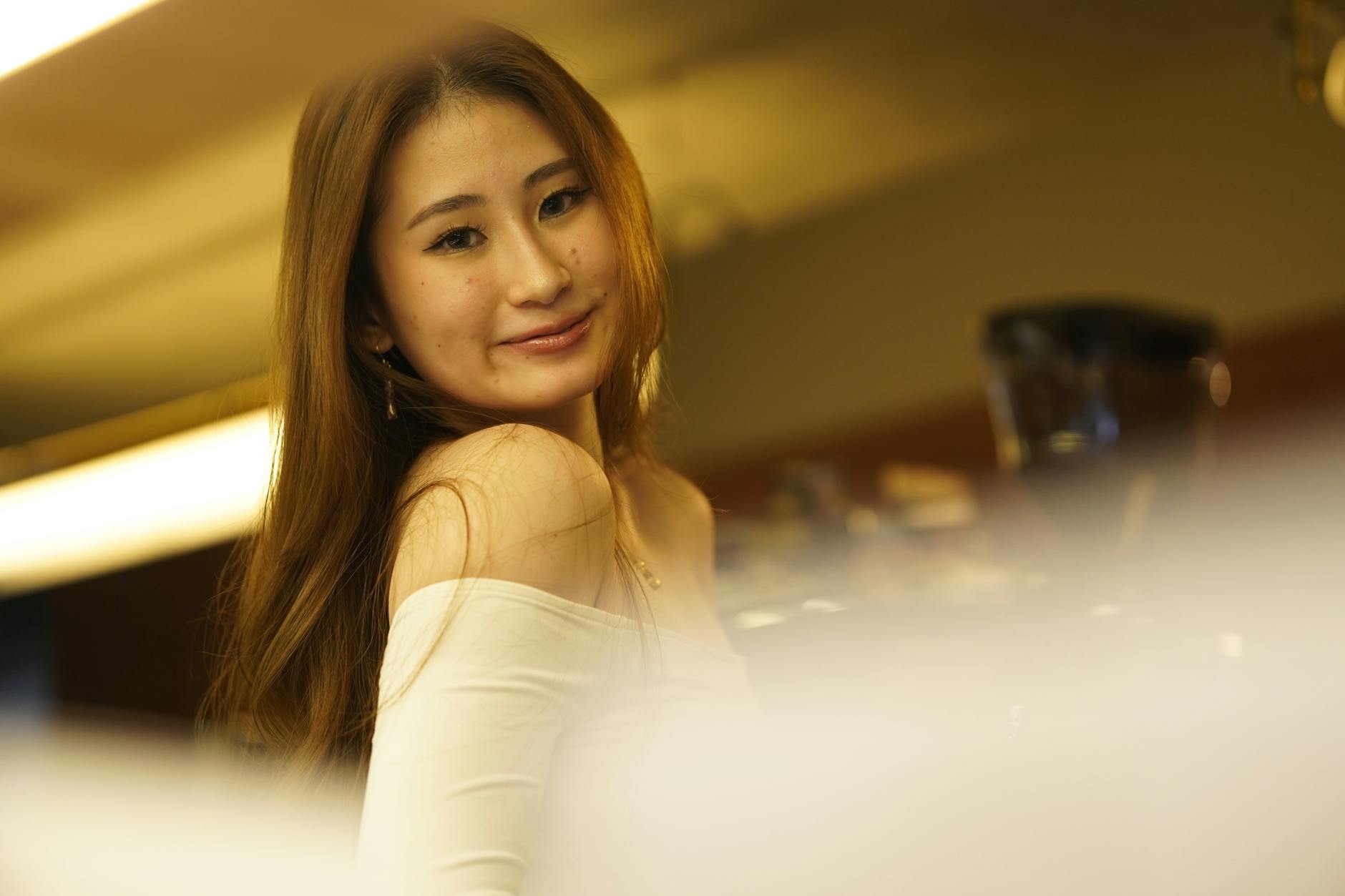 charming portrait of a smiling woman indoors